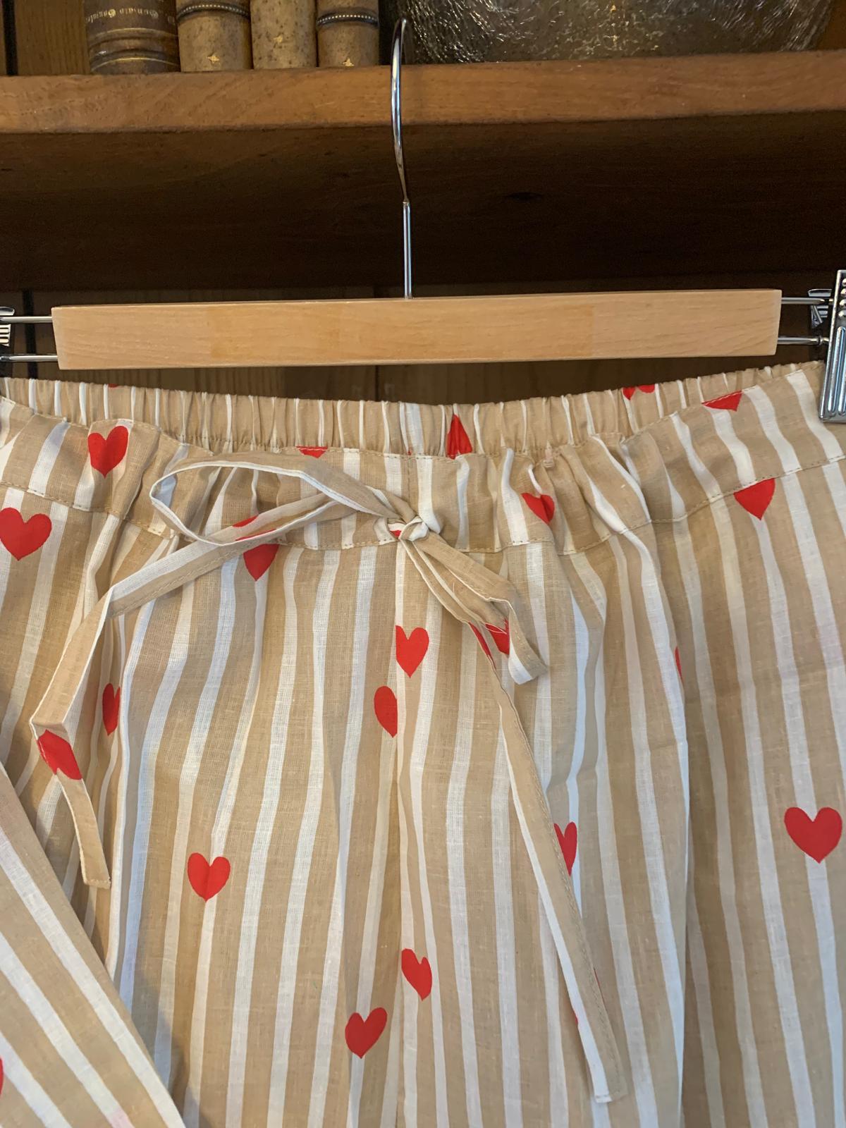 Pijama rayitas beige